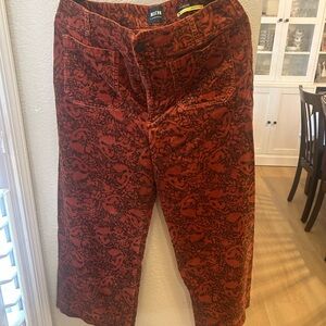 Anthropologie Red and Brown Ankle-Length Pants with Intricate Patterns
